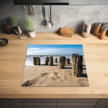 Protector de inducción - Postes desgastados en la playa