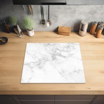 Protector de inducción - La elegancia del mármol blanco